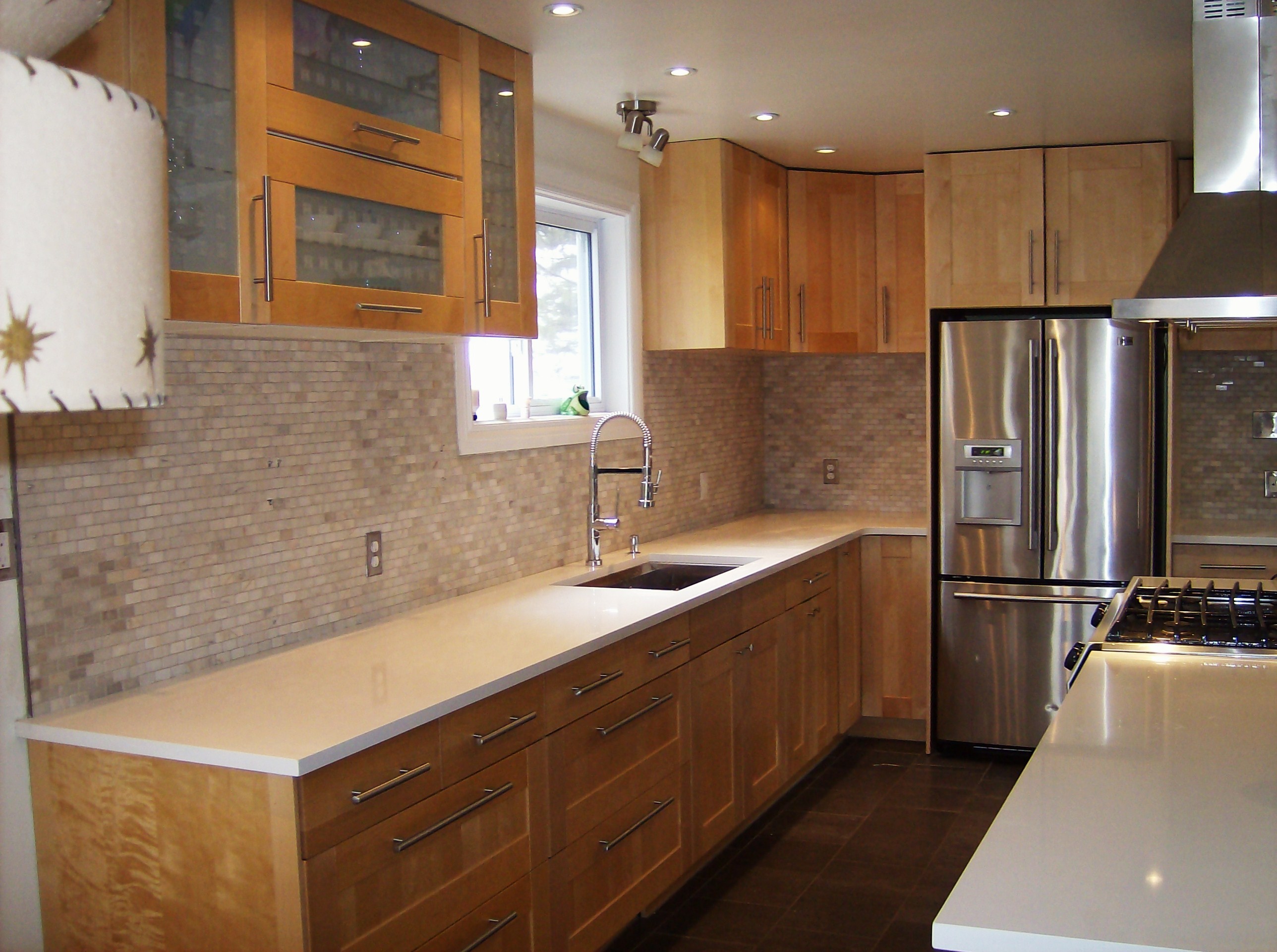 Natural stone mosaic kitchen backsplash